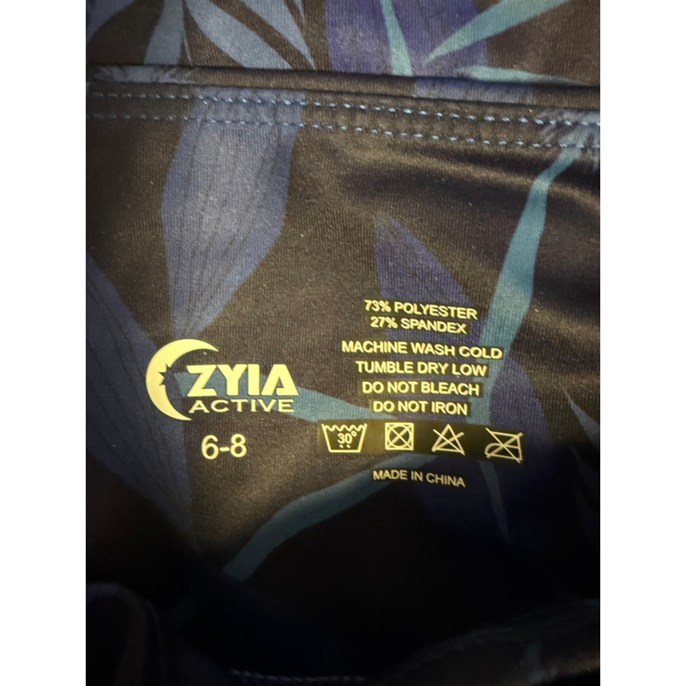 Women's ZYIA ACTIVE Blue Navy Tropical Print Hi-Rise Capri Leggings SZ 6-8 New - Picture 3 of 16